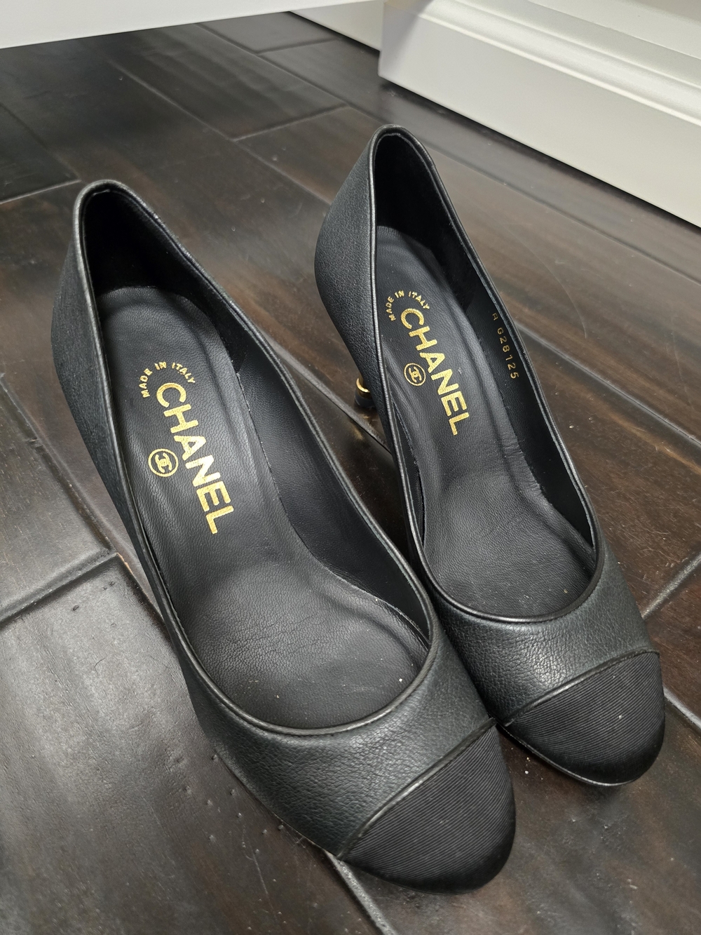 CHANEL Black Leather Cap-Toe Pumps